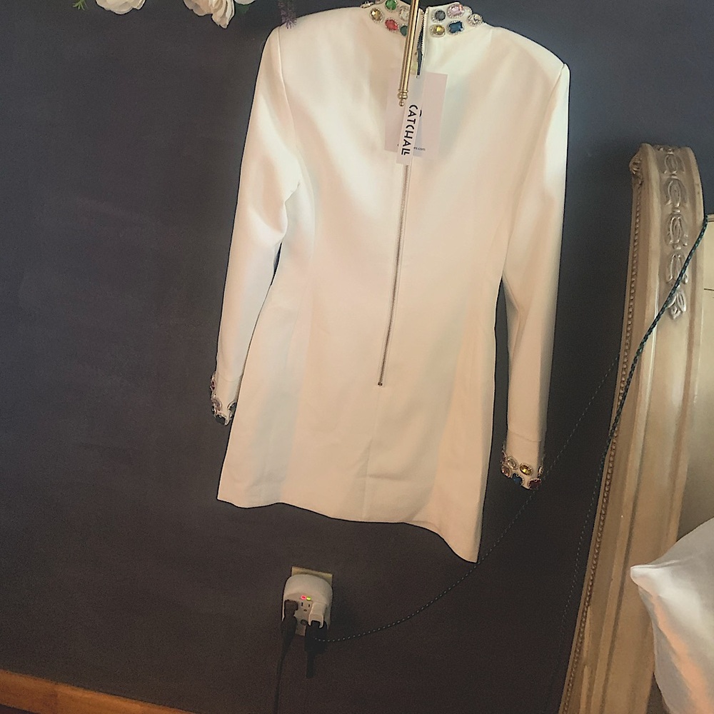 Catchall cream dress with tags never worn jeweled neck and sleeves. Extra small